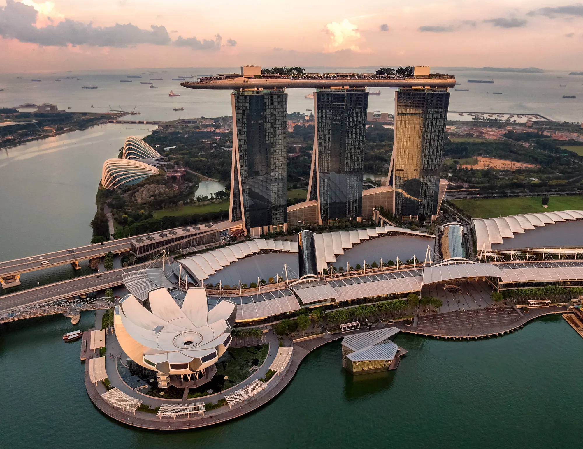 Aerial view of Marina Bay Sands and the Singapore waterfront at sunset