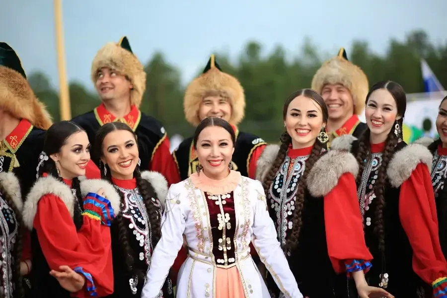 Group of performers in traditional Slavic folk costumes